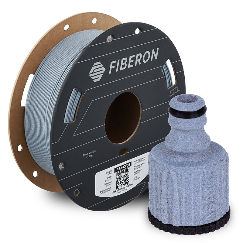 Spool of Fiberon 3D printing filament and a printed object on a white background