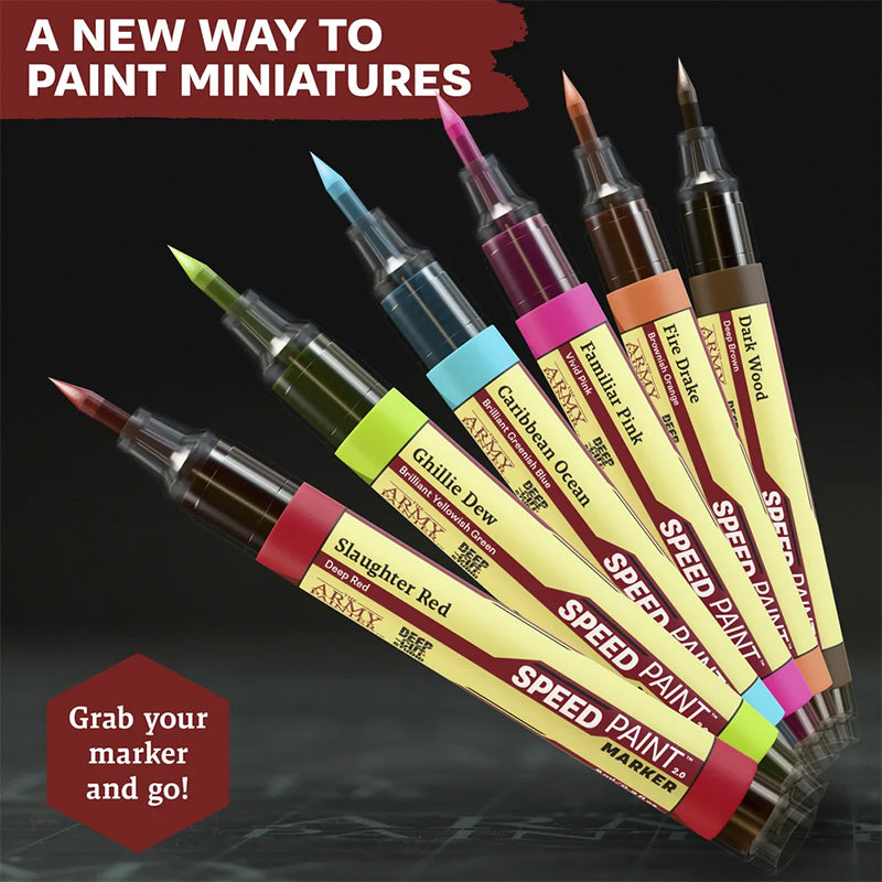 Assorted colorful Army Painter Speedpaint Markers held in hand