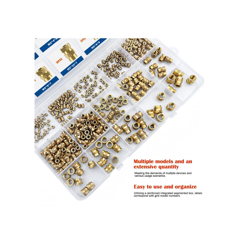 Assorted brass knurled threaded inserts pile showing smooth threads and uniform structure