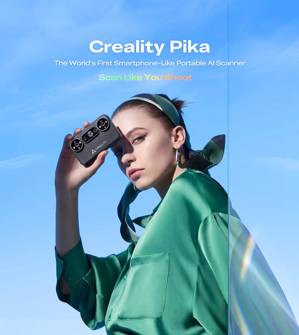 Woman holding the lightweight Creality Pika portable AI 3D scanner demonstrating its compact size.