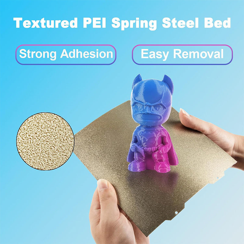 Flexing textured PEI spring steel bed showing strong adhesion and easy model removal